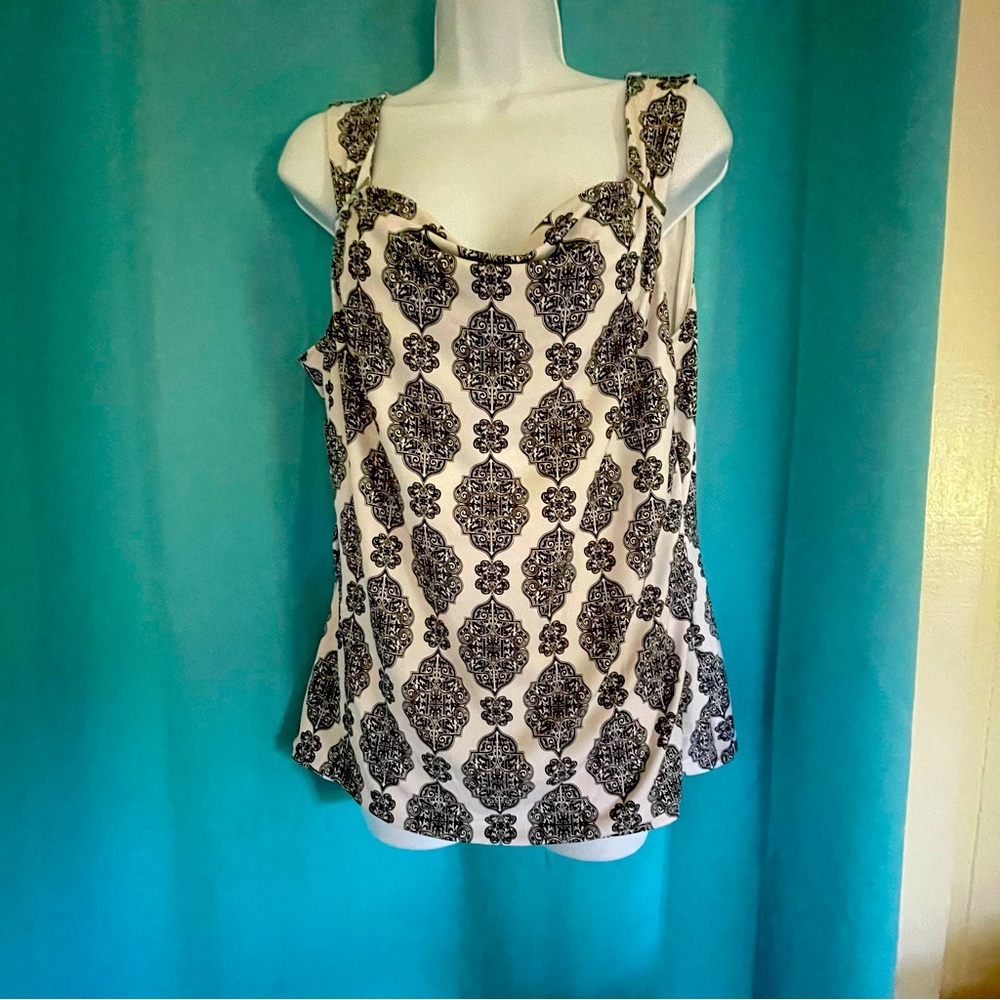 Sleeveless lined with gold bars to add to the collection